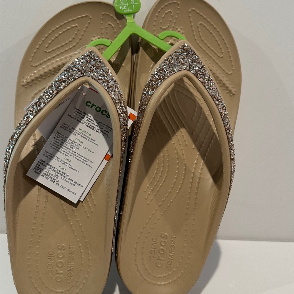 NWT CROCS Flip Flops with Bling on the front.
